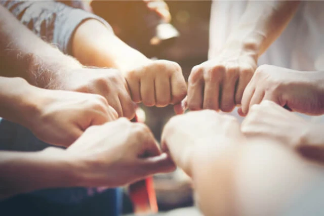 Teamwork – United effort for shared success.